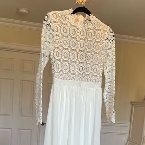 Beautiful white lace gown, fully lined.